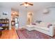 Living room featuring a sectional sofa and hardwood floors at 310 W Hilda St, Tampa, FL 33603