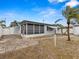 Exterior view of a single story home with brick pavers at 3148 Domino Dr, Holiday, FL 34691