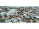 An aerial view highlighting a single-Gathering home's desirable location near the water at 342 Boca Ciega Dr, Madeira Beach, FL 33708