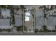 Bird's-eye view of a home's layout and lot size, showing the backyard and surrounding area at 342 Boca Ciega Dr, Madeira Beach, FL 33708