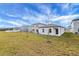 New construction home with a spacious backyard and open views at 35605 Buttonweed Trl, Zephyrhills, FL 33541