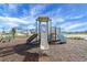 Modern playground with climbing structures and slides at 35605 Buttonweed Trl, Zephyrhills, FL 33541