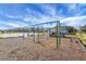 playground with swings and play area at 35605 Buttonweed Trl, Zephyrhills, FL 33541