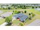 House with gray roof, surrounded by other homes and greenery at 364 San Ambrosio St, Punta Gorda, FL 33983