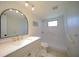 Updated bathroom with walk-in shower and modern vanity at 364 San Ambrosio St, Punta Gorda, FL 33983