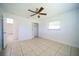 Bedroom with tile floors and ceiling fan at 364 San Ambrosio St, Punta Gorda, FL 33983