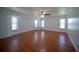 Bright bedroom with hardwood floors and multiple windows at 364 San Ambrosio St, Punta Gorda, FL 33983