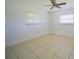 Bright bedroom with tile floors and ceiling fan at 364 San Ambrosio St, Punta Gorda, FL 33983