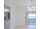 Bright dining room with tile floors and sliding glass doors at 364 San Ambrosio St, Punta Gorda, FL 33983