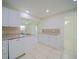 White kitchen with granite countertops and ample cabinet space at 364 San Ambrosio St, Punta Gorda, FL 33983