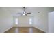 Living room with wood-look flooring and ceiling fan at 364 San Ambrosio St, Punta Gorda, FL 33983