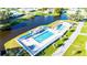 Aerial view of community pool and lake at 5149 Jo St, Zephyrhills, FL 33542