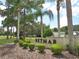 Betmar community entrance with lush landscaping at 5149 Jo St, Zephyrhills, FL 33542