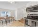 Bright dining area with a wood table and four chairs at 5161 Rena N St, St Petersburg, FL 33709