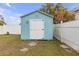 Light blue storage shed in backyard at 5161 Rena N St, St Petersburg, FL 33709