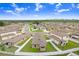 Aerial view of houses in a residential neighborhood at 5403 Fez Ct, Brooksville, FL 34602