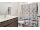 Clean bathroom with shower/tub combo, vanity, and toilet at 5403 Fez Ct, Brooksville, FL 34602