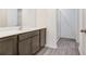 Clean bathroom with a vanity and a walk-in shower at 5403 Fez Ct, Brooksville, FL 34602