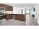 Modern kitchen featuring stainless steel appliances and an island at 5403 Fez Ct, Brooksville, FL 34602