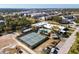 Aerial view of community tennis courts and pool at 5750 80Th St N # B106, St Petersburg, FL 33709