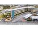 Aerial view of condo complex, showing building and parking at 5750 80Th St N # B106, St Petersburg, FL 33709