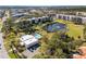 Aerial view of community with pool and pond at 5750 80Th St N # B106, St Petersburg, FL 33709