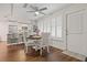 Dining area with table and chairs, hardwood floors at 5750 80Th St N # B106, St Petersburg, FL 33709