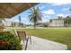 Relaxing patio with a view of the community and lush landscaping at 5750 80Th St N # B106, St Petersburg, FL 33709