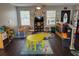 Play area with toys, play structures, and a large TV at 5805 34Th S Ave, Tampa, FL 33619