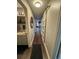 Bright hallway with barn door and view into living area at 5805 34Th S Ave, Tampa, FL 33619