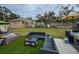 Outdoor patio area with seating and a view of the playground at 5805 34Th S Ave, Tampa, FL 33619