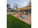 Outdoor playground with shaded structure and play equipment for  at 5805 34Th S Ave, Tampa, FL 33619