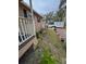 Side yard with landscaping and a food truck at 5805 34Th S Ave, Tampa, FL 33619