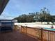 Wooden deck overlooking the backyard pool at 7336 Orchard Dr, Wesley Chapel, FL 33545