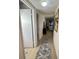 Light and airy hallway with wood-look flooring at 7533 Pitch Pine Cir # 18, Tampa, FL 33617