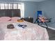 Main bedroom with a double bed and nightstand at 7607 Lavender Ln, Tampa, FL 33619