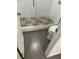 Updated bathroom with a glass shower and pebble floor at 8006 N Rome Ave, Tampa, FL 33604