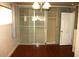 Large bedroom closet with sliding glass doors and shelving at 8006 N Rome Ave, Tampa, FL 33604