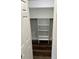 White closet with shelving and hanging rod at 8006 N Rome Ave, Tampa, FL 33604