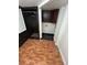 Laundry room with washer/dryer hookups and tile floor at 8006 N Rome Ave, Tampa, FL 33604