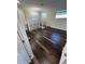 Bright loft boasting hardwood floors and a lovely chandelier at 8006 N Rome Ave, Tampa, FL 33604