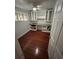 Bright home office with built-in white cabinets and hardwood floors at 8006 N Rome Ave, Tampa, FL 33604