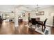 Open dining room with dark wood floors and granite table at 808 W Hollywood St, Tampa, FL 33604