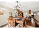 Open concept dining room, looking into the kitchen and living room at 808 W Hollywood St, Tampa, FL 33604