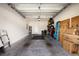 Attached garage with storage shelving and space for two cars at 808 W Hollywood St, Tampa, FL 33604