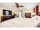 Luxurious main bedroom with large TV and ample closet space at 808 W Hollywood St, Tampa, FL 33604