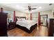 Large main bedroom with hardwood floors and ceiling fan at 808 W Hollywood St, Tampa, FL 33604