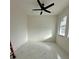 Bright bedroom with ceiling fan and marble flooring at 8206 N Marks St, Tampa, FL 33604