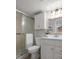 Clean bathroom with a shower/tub combo, toilet and updated vanity at 845 S Gulfview Blvd # 208, Clearwater Beach, FL 33767