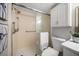 Clean bathroom with a shower, toilet and updated vanity at 845 S Gulfview Blvd # 208, Clearwater Beach, FL 33767